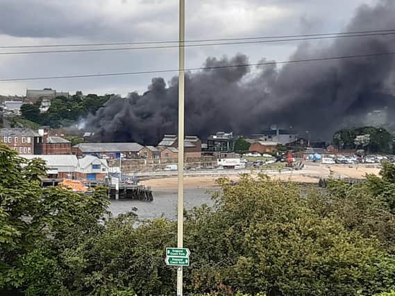 Smoke can be seen across the River Tyne from a fire in North Shields.