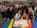 South Tyneside Council Cllr Adam Ellison joins pupils from across the Borough at Boldon School to celebrate diversity during Pride Month.  Signing the pledge are pupils Daisy Briggs and Alesha Charlton, with Cllr Ellison and Melanie Brown.