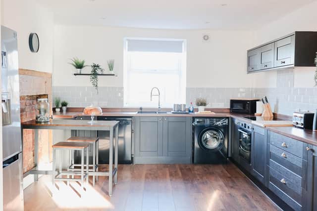 The open plan kitchen at Beachcomber Loft. Photo by Helen Russell Photography