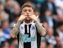 Newcastle United's English defender Kieran Trippier whistles to teamamtes during the English Premier League football match between Manchester City and Newcastle United at the Etihad Stadium in Manchester, north west England, on May 8, 2022. (Photo by PAUL ELLIS/AFP via Getty Images)