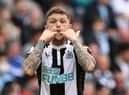 Newcastle United's English defender Kieran Trippier whistles to teamamtes during the English Premier League football match between Manchester City and Newcastle United at the Etihad Stadium in Manchester, north west England, on May 8, 2022. (Photo by PAUL ELLIS/AFP via Getty Images)