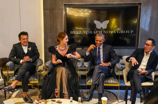A picture provided by the BN Group, showing former US president Barack Obama with the company's three founder members.