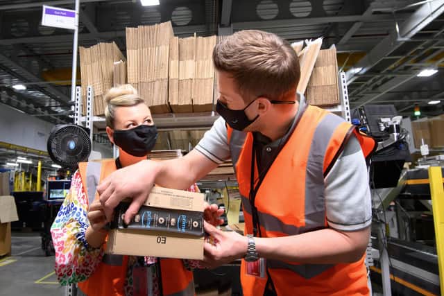 Chris and Rosie Ramsey visit the team at Amazon’s Fulfilment Centre in Tilbury, London, to follow the journey of a product from one of Amazon’s small business sellers, from production right through to delivery, to mark Prime Day, which begins on Monday June 21. Photo by Jonathan Hordle/PA Wire.