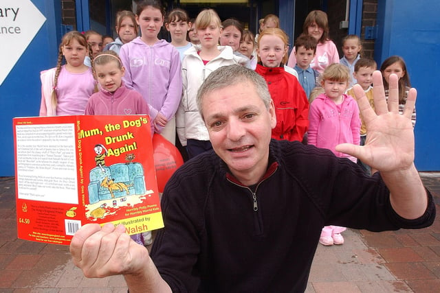 Children's poet Gez Walsh met with local children when he visited the library in 2005. Is there someone you know in this photo?