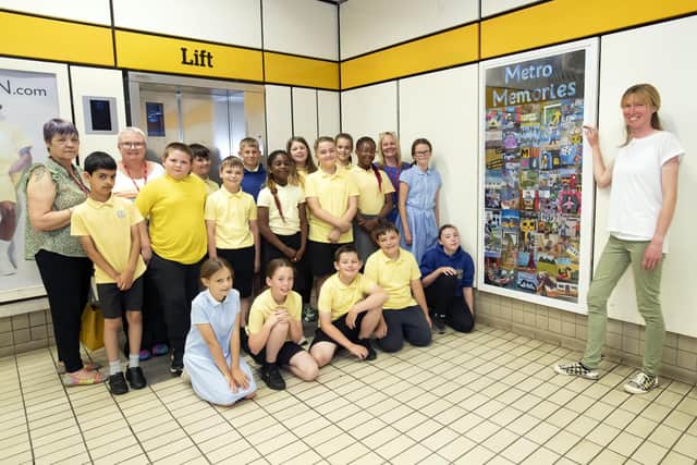 Pupils and staff from Lord Blyton Primary, with artist Laura Brenchley, right, at the newly-installed artwork on Chichester Metro station