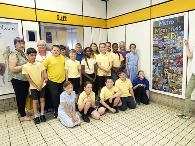 Pupils and staff from Lord Blyton Primary, with artist Laura Brenchley, right, at the newly-installed artwork on Chichester Metro station