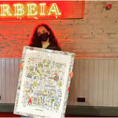 Jade Thirlwall in her home town bar Arbeia where the South Shields print by design company Lines Behind will go on display.