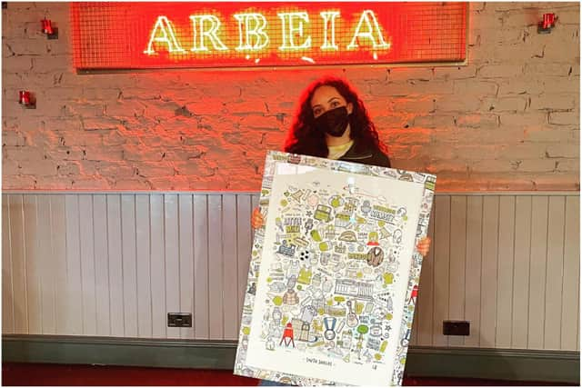 Jade Thirlwall in her home town bar Arbeia where the South Shields print by design company Lines Behind will go on display.