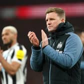 Newcastle United head coach Eddie Howe applauds fans at Wembley.