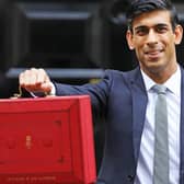 Chancellor Rishi Sunak outside 11 Downing Street, London, before heading to the House of Commons to deliver his Budget. Pic: Aaron Chown/PA Wire