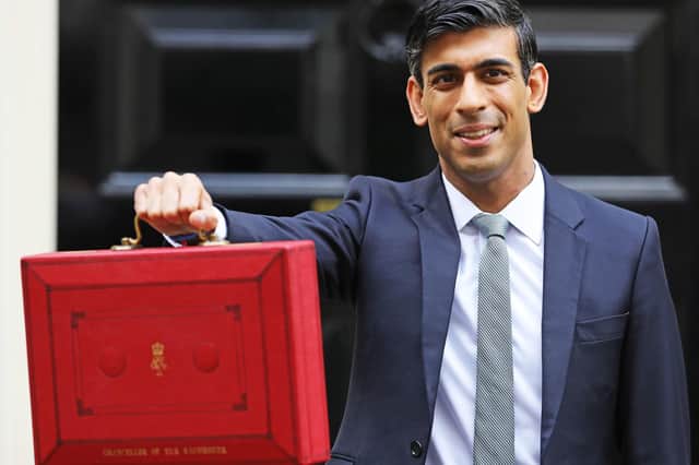 Chancellor Rishi Sunak outside 11 Downing Street, London, before heading to the House of Commons to deliver his Budget. Pic: Aaron Chown/PA Wire