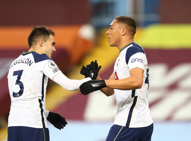 Carlos Vinicius of Tottenham Hotspur celebrates with Sergio Reguilon after scoring their side's first goal during the Premier League match between Aston Villa and Tottenham Hotspur at Villa Park on March 21, 2021 in Birmingham, England.