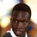 Garang Kuol speaks to the media in Sydney, Australia, after the World Cup in December.