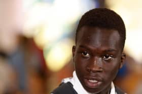 Garang Kuol speaks to the media in Sydney, Australia, after the World Cup in December.