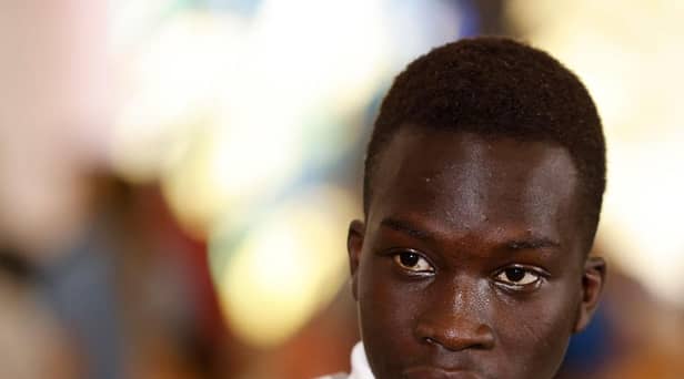 Garang Kuol speaks to the media in Sydney, Australia, after the World Cup in December.