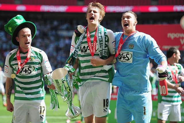 Dan Burn, Marek Stech and Patrick Madden of Yeovil Town celebrates promotion during the npower League One play off final between Brentford and Yeovil Town at Wembley Stadium on May 19, 2013 in London, England.  (Photo by Jamie McDonald/Getty Images)