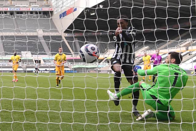 Joe Willock of Newcastle United scores their team's second goal past Hugo Lloris of Tottenham Hotspur.