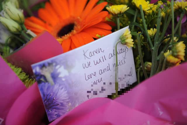 Heartfelt messages have been left by loved ones along with the flowers.