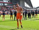 Newcastle United goalkeeper Nick Pope applauds the club's fans after the Brentford win.