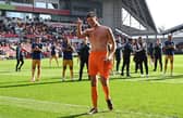 Newcastle United goalkeeper Nick Pope applauds the club's fans after the Brentford win.