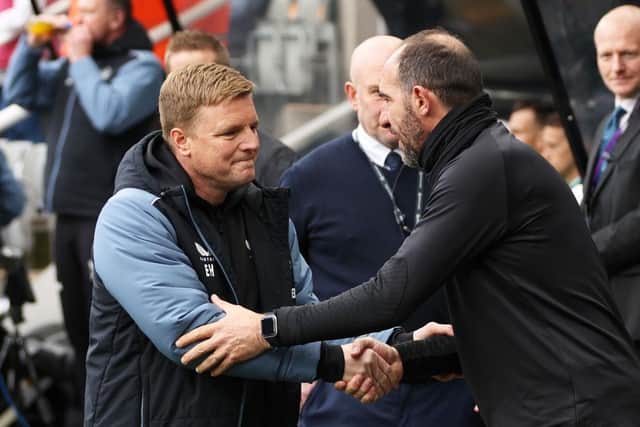 Eddie Howe, Manager of Newcastle United, embraces Cristian Stellini, Interim Manager of Tottenham Hotspur, prior to the Premier League match between Newcastle United and Tottenham Hotspur at St. James Park on April 23, 2023 in Newcastle upon Tyne, England. (Photo by Clive Brunskill/Getty Images)