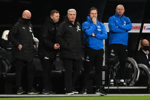 Steve Agnew, First Team Coach, Graeme Jones, Assistant Manager, Steve Bruce, Manager of Newcastle United and Stephen Clemence, First Team Coach look on during the Premier League match between Newcastle United and Aston Villa at St. James Park on March 12, 2021 in Newcastle upon Tyne, England.