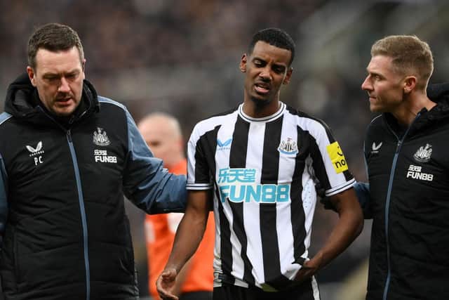 Newcastle United striker Alexander Isak leaves the field against Southampton after being struck on the head by the ball.