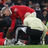 Manchester United's Marcus Rashford receives treatment last night.