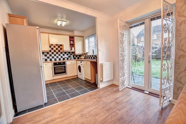 The kitchen features built in electric oven and hob, extractor hood, built in cupboard and plumbed for automatic washing machine. The stylish French doors provide easy access to the rear garden.

Photo: Rightmove