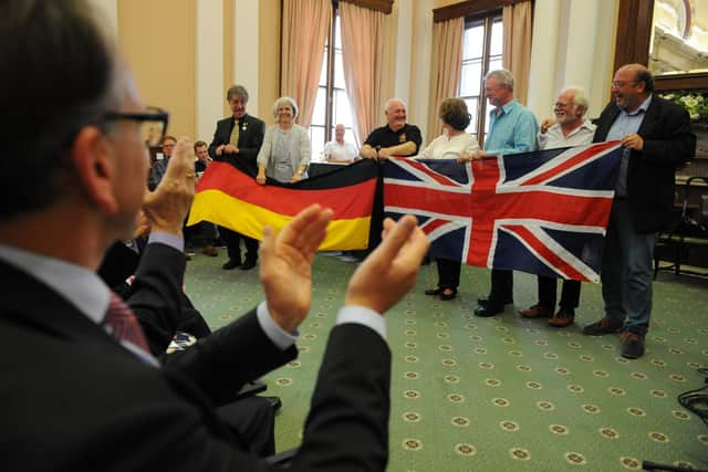 The Mayor Coun Alan Smith and Mayoress Coun Moira Smith, with Oberburgermeister Andreas Mucke from Wuppertal, and members of Knapp Daneben, and Salto Vocale, at a Civic Reception held at South Shields Town Hall.