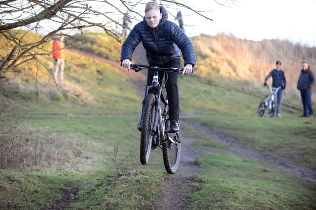 Young people at the old BMX track at Temple Park.