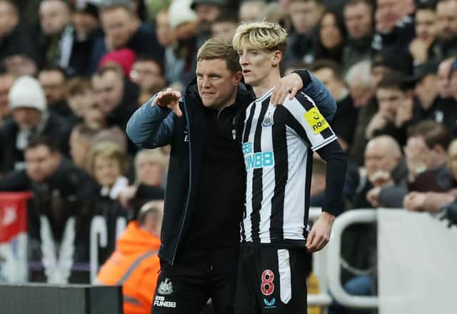 Eddie Howe, Manager of Newcastle United, interacts with Anthony Gordon of Newcastle United during the Premier League match between Newcastle United and West Ham United at St. James Park on February 04, 2023 in Newcastle upon Tyne, England. (Photo by Ian MacNicol/Getty Images)