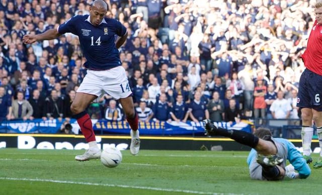 Chris Iwelumo: Presented with an open goal against Norway and a debut dream - it became a nightmare as the Scotland striker inexplicably side-footed wide with Hampden already celebrating.