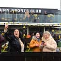 Lynn Martin (centre)  the mother of winning goal scorer Olly Martrin, celebrates