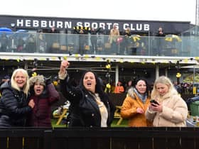 Lynn Martin (centre)  the mother of winning goal scorer Olly Martrin, celebrates