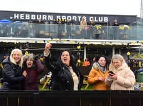 Lynn Martin (centre)  the mother of winning goal scorer Olly Martrin, celebrates