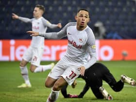 Salzburg's Swiss midfielder Noah Okafor celebrates after scoring a goal during the UEFA Champions League Group G football match RB Salzburg v Sevilla in Salzburg, Austria on December 8, 2021. - Austria OUT (Photo by HANS PUNZ / APA / AFP) / Austria OUT (Photo by HANS PUNZ/APA/AFP via Getty Images)