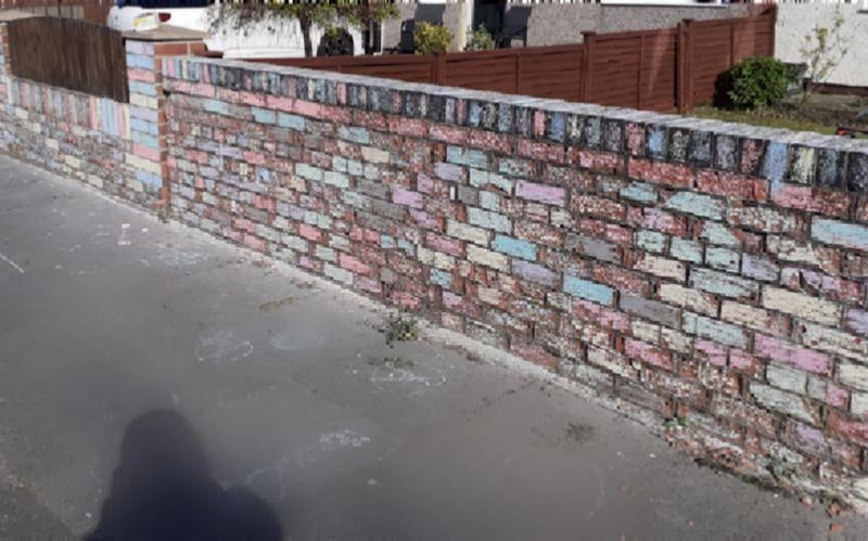 Lisa Bainbridge sent in this picture, commenting: "Mine and my neighbour's wall. The girls next door done theirs . They started on mine. I finished it."