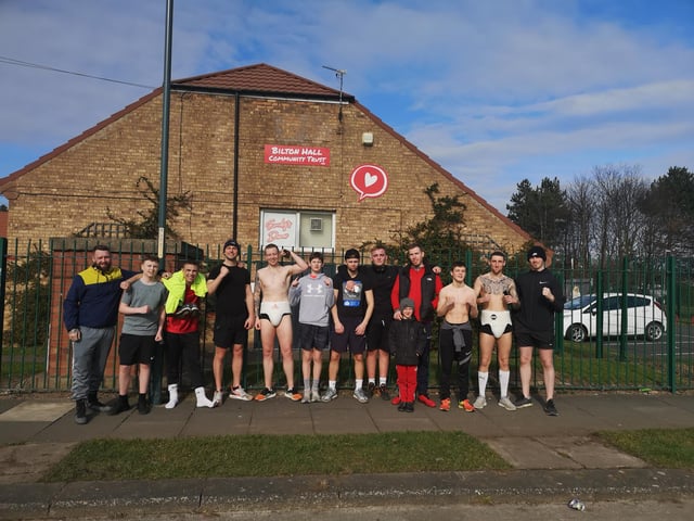 Members of the Bilton Hall ABC limbering up before the 48-mile challenge.