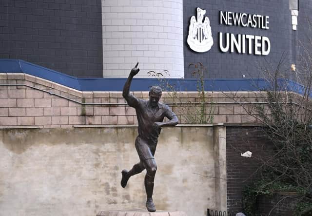 The statue of Alan Shearer is seen outside the club walls.