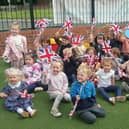 Ashfield nursery children celebrating the Queen's Platinum Jubilee.