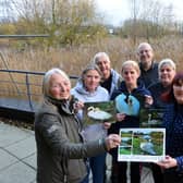 Pawz For Thought receive over £1000 from Boldon Pond swans calendar. Front Pawz for Thought founder Lynne Eddale and swans friend group Carol Yung.