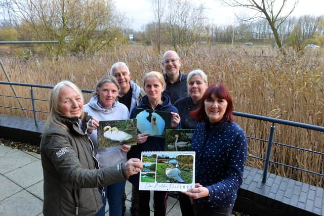 Pawz For Thought receive over £1000 from Boldon Pond swans calendar. Front Pawz for Thought founder Lynne Eddale and swans friend group Carol Yung.