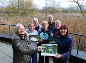 Pawz For Thought receive over £1000 from Boldon Pond swans calendar. Front Pawz for Thought founder Lynne Eddale and swans friend group Carol Yung.