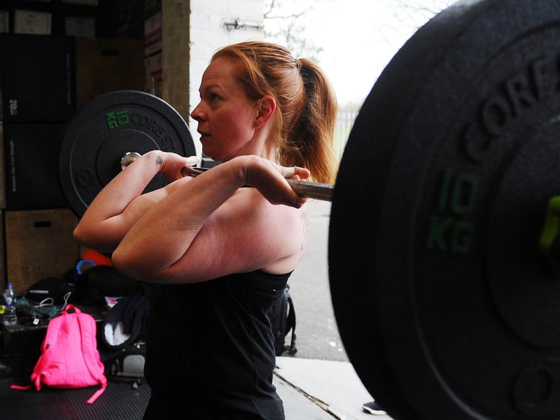 Gym-goer seen making the most of the weights at Crossfit 1298 in Falkirk as it reopens to members again.