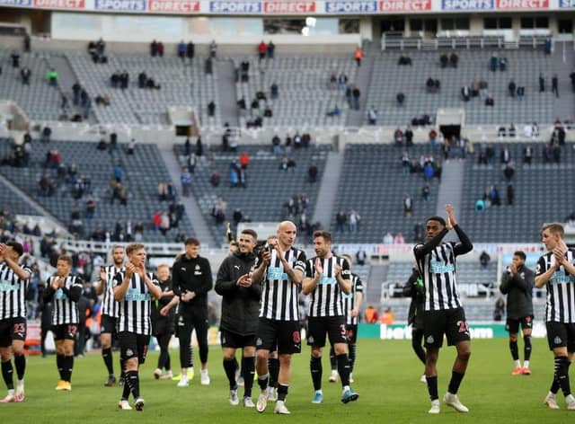 Newcastle United's players thank the fans after the English Premier League football match between Burnley and Liverpool at Turf Moor in Burnley, north west England on May 19, 2021. - Newcastle won the game 1-0.