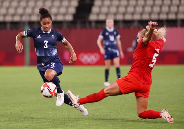 Demi Stokes of Team GB is challenged by Adriana Leon of Team Canada during the Women's Group E match on day four of the Tokyo 2020 Olympic Games at Kashima Stadium on July 27, 2021 in Kashima, Ibaraki, Japan. (Photo by Atsushi Tomura/Getty Images)