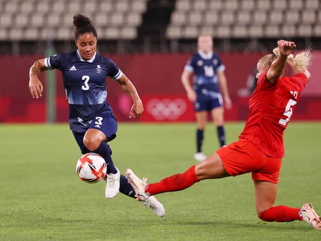 Demi Stokes of Team GB is challenged by Adriana Leon of Team Canada during the Women's Group E match on day four of the Tokyo 2020 Olympic Games at Kashima Stadium on July 27, 2021 in Kashima, Ibaraki, Japan. (Photo by Atsushi Tomura/Getty Images)