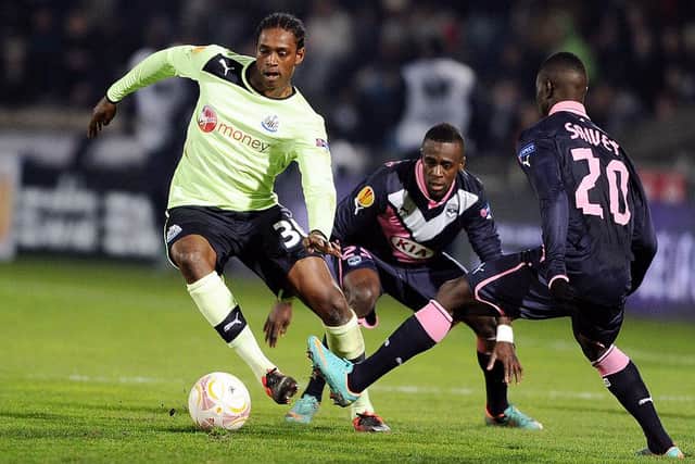Newcastle's forward Nile Ranger (L) vies for the ball with Bordeaux's midfielder Henri Saivet (R) during the UEFA Europa League match between FC Girondins de Bordeaux and Newcastle United FC at the Chaban Delmas Stadium in Bordeaux on December 6, 2012. AFP PHOTO/ NICOLAS TUCAT (Photo credit should read NICOLAS TUCAT/AFP via Getty Images)