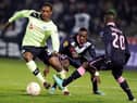 Newcastle's forward Nile Ranger (L) vies for the ball with Bordeaux's midfielder Henri Saivet (R) during the UEFA Europa League match between FC Girondins de Bordeaux and Newcastle United FC at the Chaban Delmas Stadium in Bordeaux on December 6, 2012. AFP PHOTO/ NICOLAS TUCAT        (Photo credit should read NICOLAS TUCAT/AFP via Getty Images)
